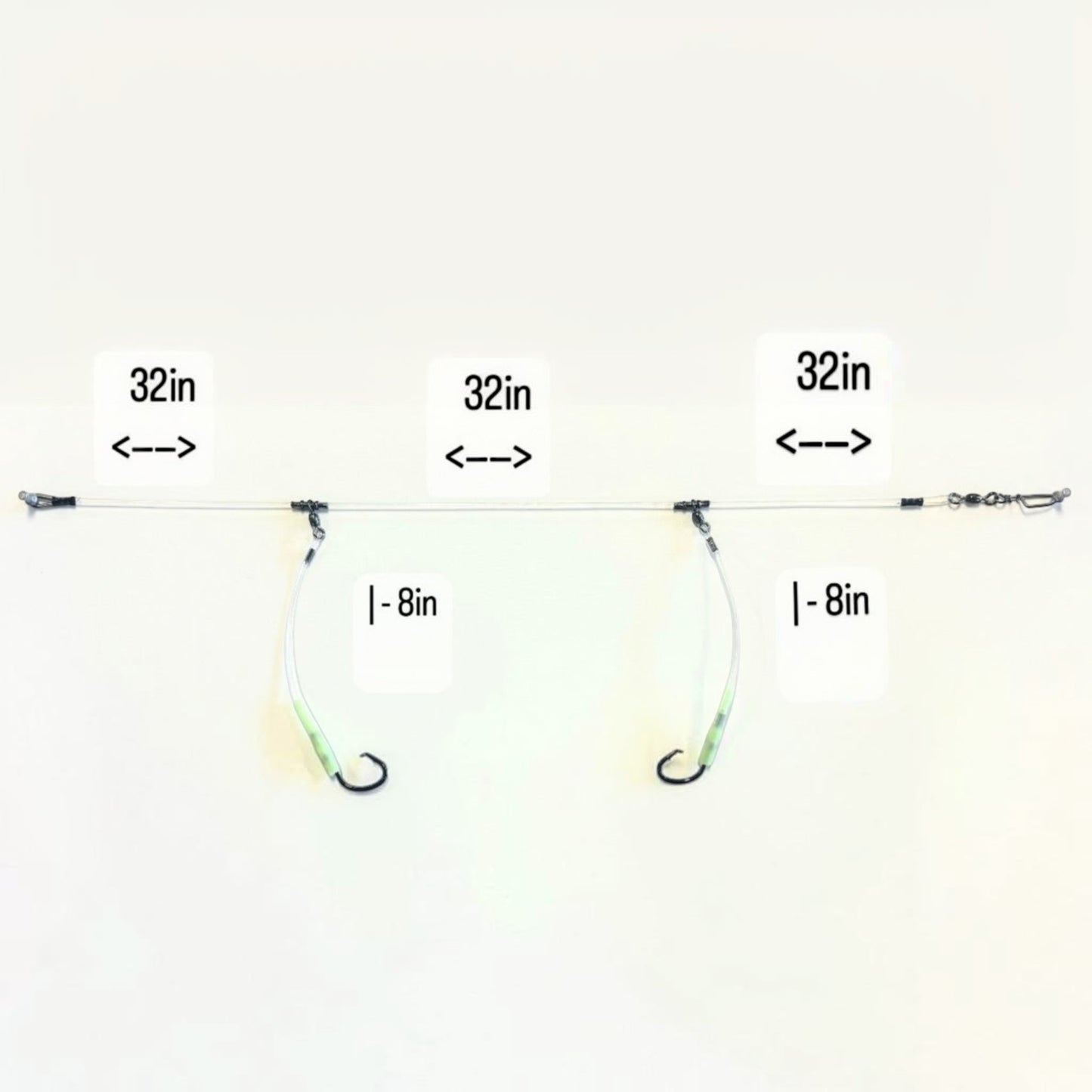 Dogfish Tackle & Marine deep drop fishing rig with two hooks, glow-in-the-dark chafe protectors, and heavy duty black nickel circle hooks.
