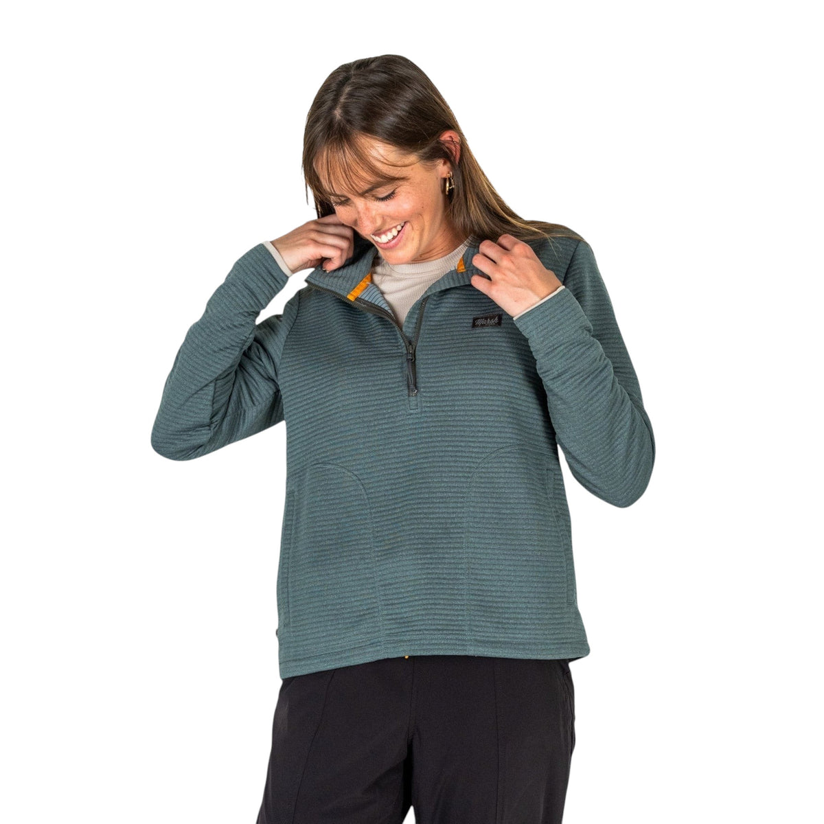 Dogfish Tackle & Marine women's teal quilted quarter zip fleece with thumbholes and cinch hem