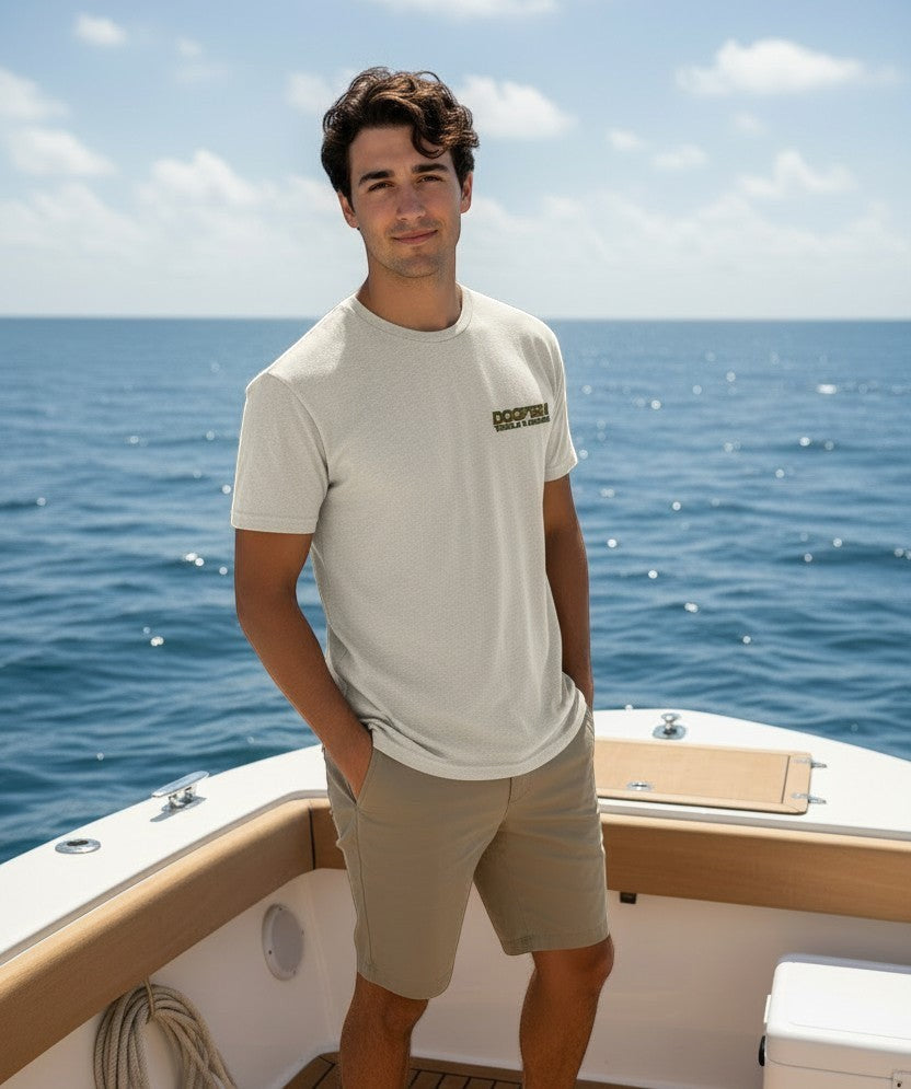 Man standing on a boat with ocean and sky in the background