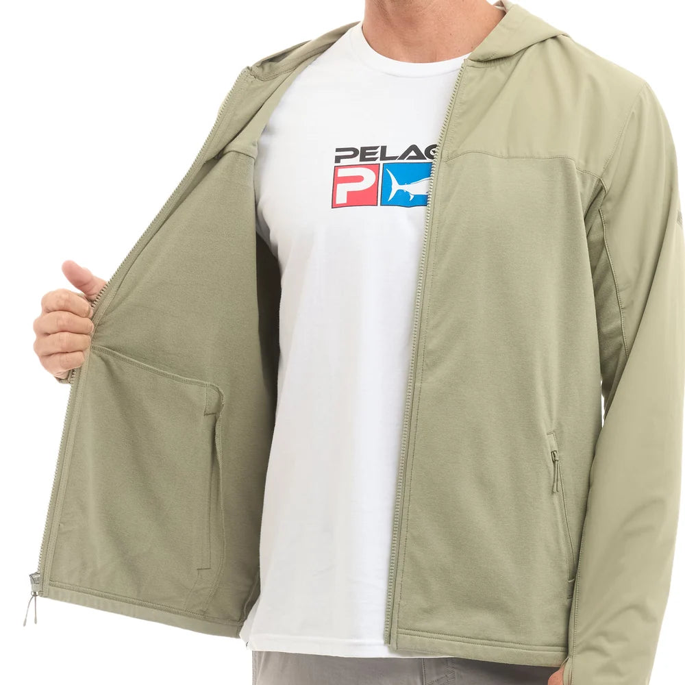 A man wearing an olive green hooded zip-up jacket over a white t-shirt with a red and blue PELAGIC logo. The jacket is shown open, displaying its pockets and interior lining.