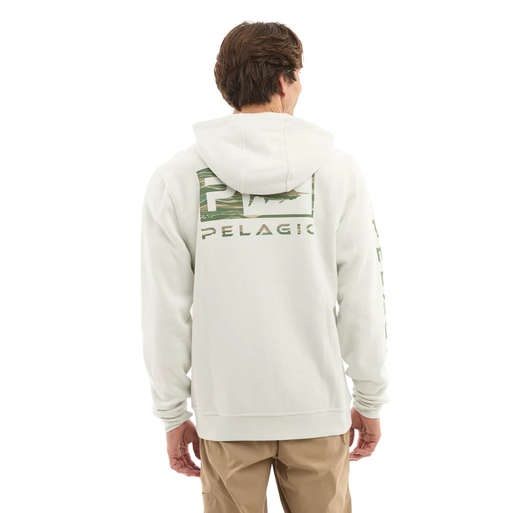 Person wearing a white hoodie with a logo on the back, standing against a white background