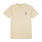 A light beige crewneck t-shirt with a small blue graphic on the left chest featuring the word 'Pralude' and a bird, displayed on a solid white background.