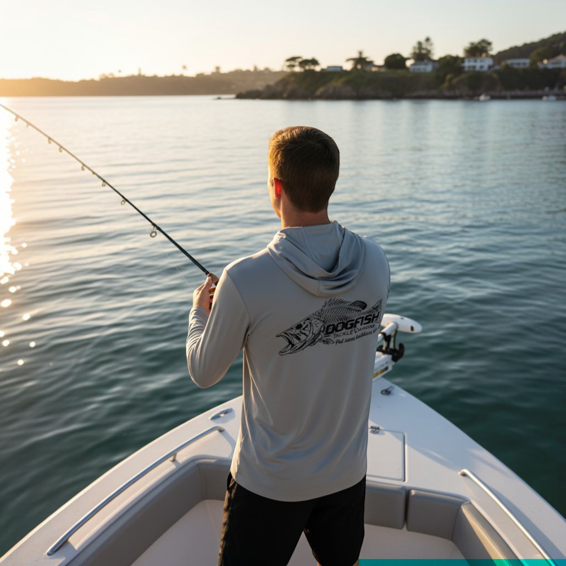 Man fishing on a boat by a body of water during sunset.