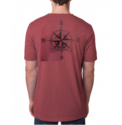 Maroon t-shirt with a compass design on the back, worn by a person.