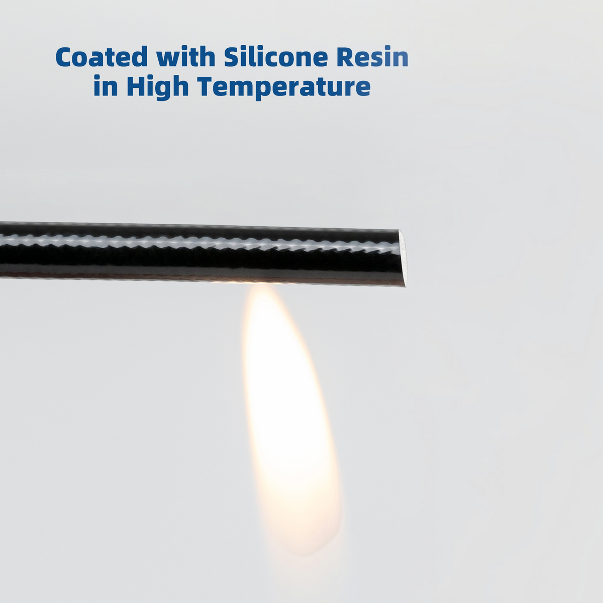 Dogfish Tackle & Marine black silicone fiberglass chafe guard being tested with a flame for heat resistance