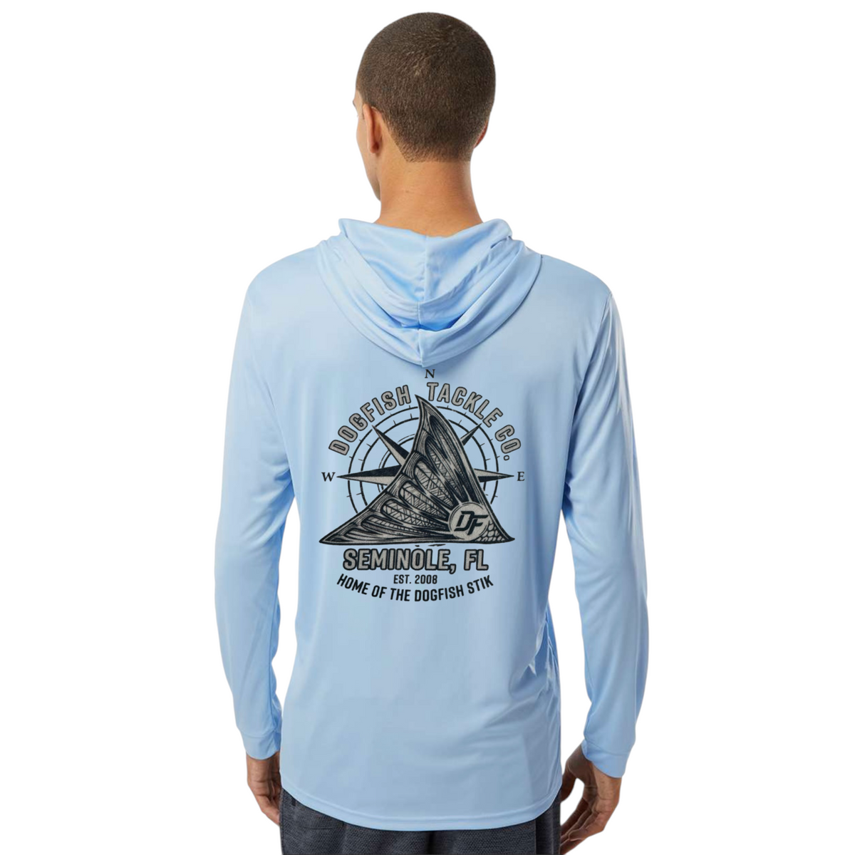 A man wearing a light blue Dogfish Tackle & Marine long sleeve performance hoodie with a tailing redfish logo on back.