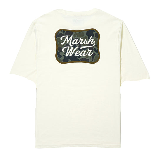 White t-shirt with a camouflage patch and 'Marsh Wear' text on a white background