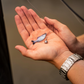 Dogfish Tackle & Marine 6th Sense Panorama swimbait held in a palm with a jighead for finesse fishing