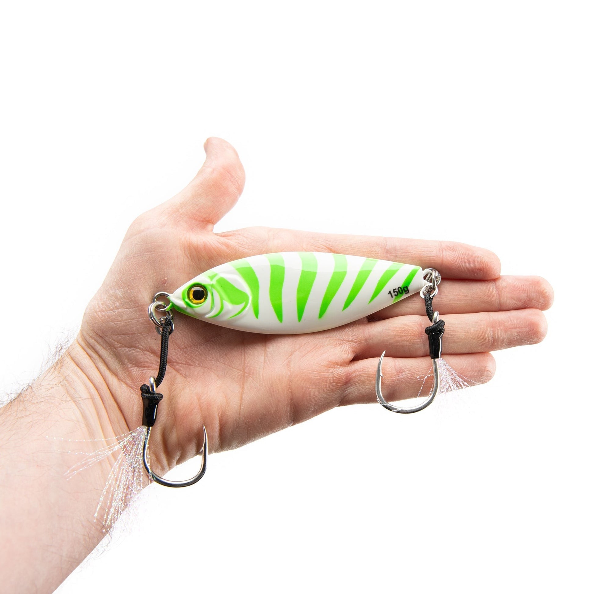 Dogfish Tackle & Marine Angler Co Widowmaker Jig, 150g slow pitch jig with white and green striped pattern, shad-profile body, and two assist hooks.
