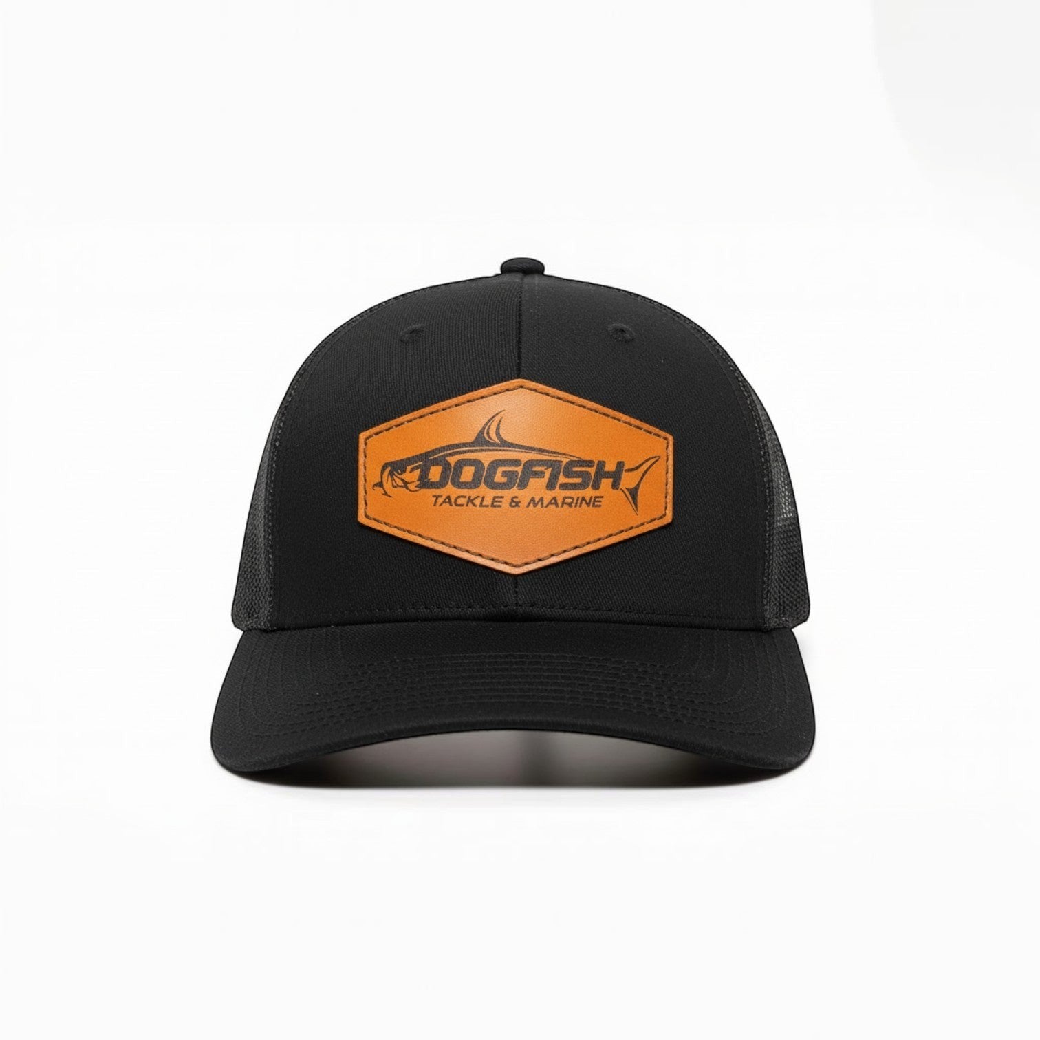 Dogfish Tackle & Marine black trucker hat with a hexagonal leather patch featuring a tarpon logo.