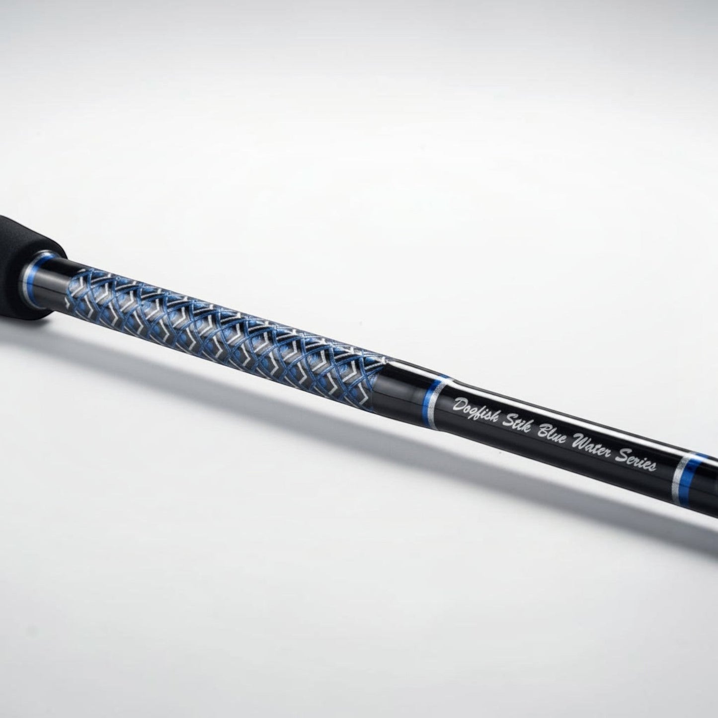 Dogfish Tackle & Marine Dogfish Stik Blue Water Series conventional fishing rod with blue and silver woven grip.