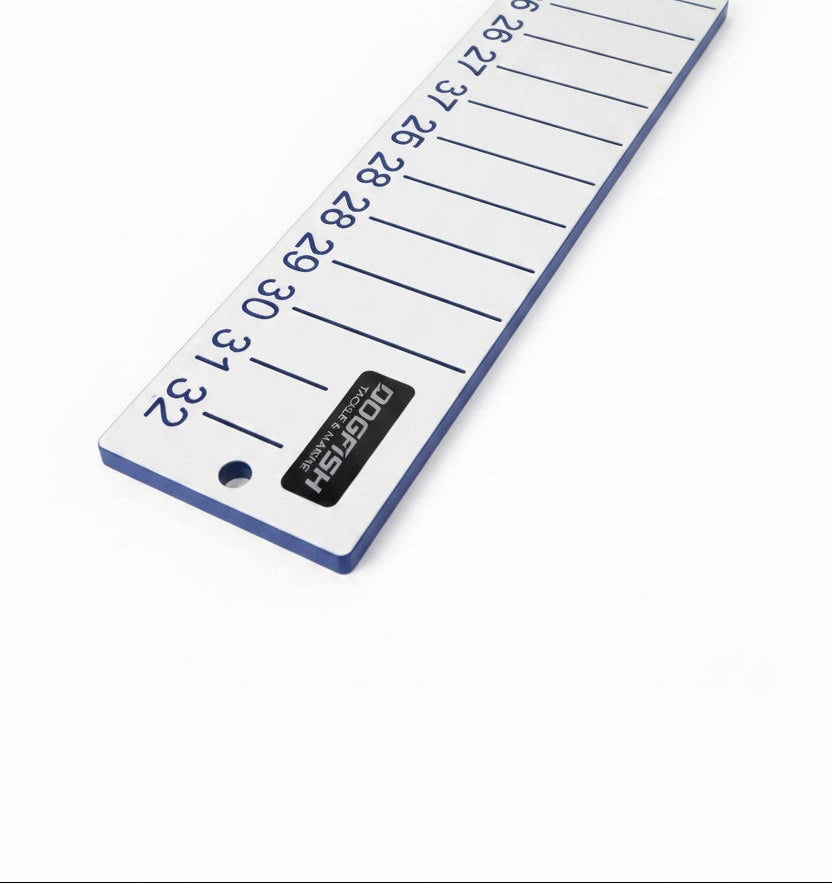 Dogfish Tackle & Marine white bump board with blue measurement markings from 25-32 inches. Made of marine grade starboard.