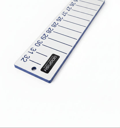 Dogfish Tackle & Marine white bump board with blue measurement markings from 25-32 inches. Made of marine grade starboard.