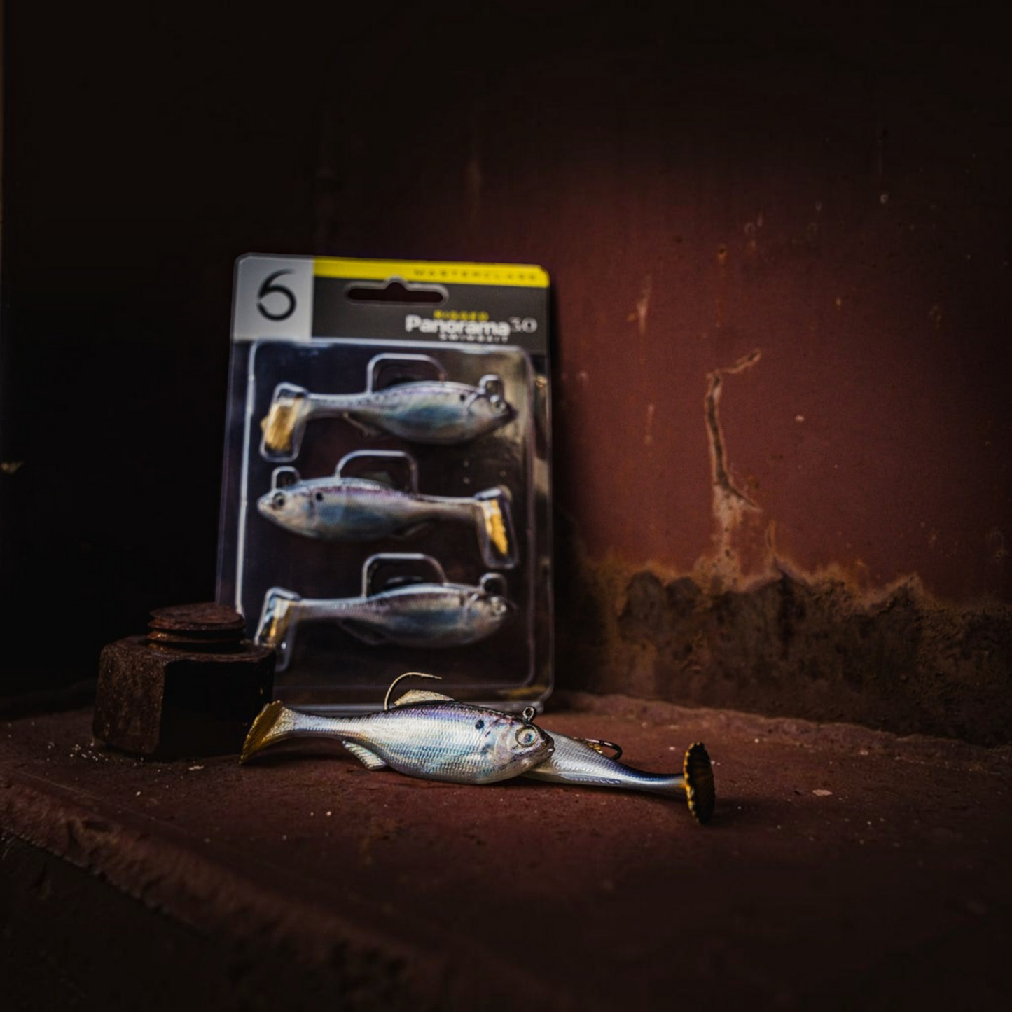 Dogfish Tackle & Marine 6th Sense Panorama Rigged Swimbait pack and loose lures with realistic 3D finish on a ledge.