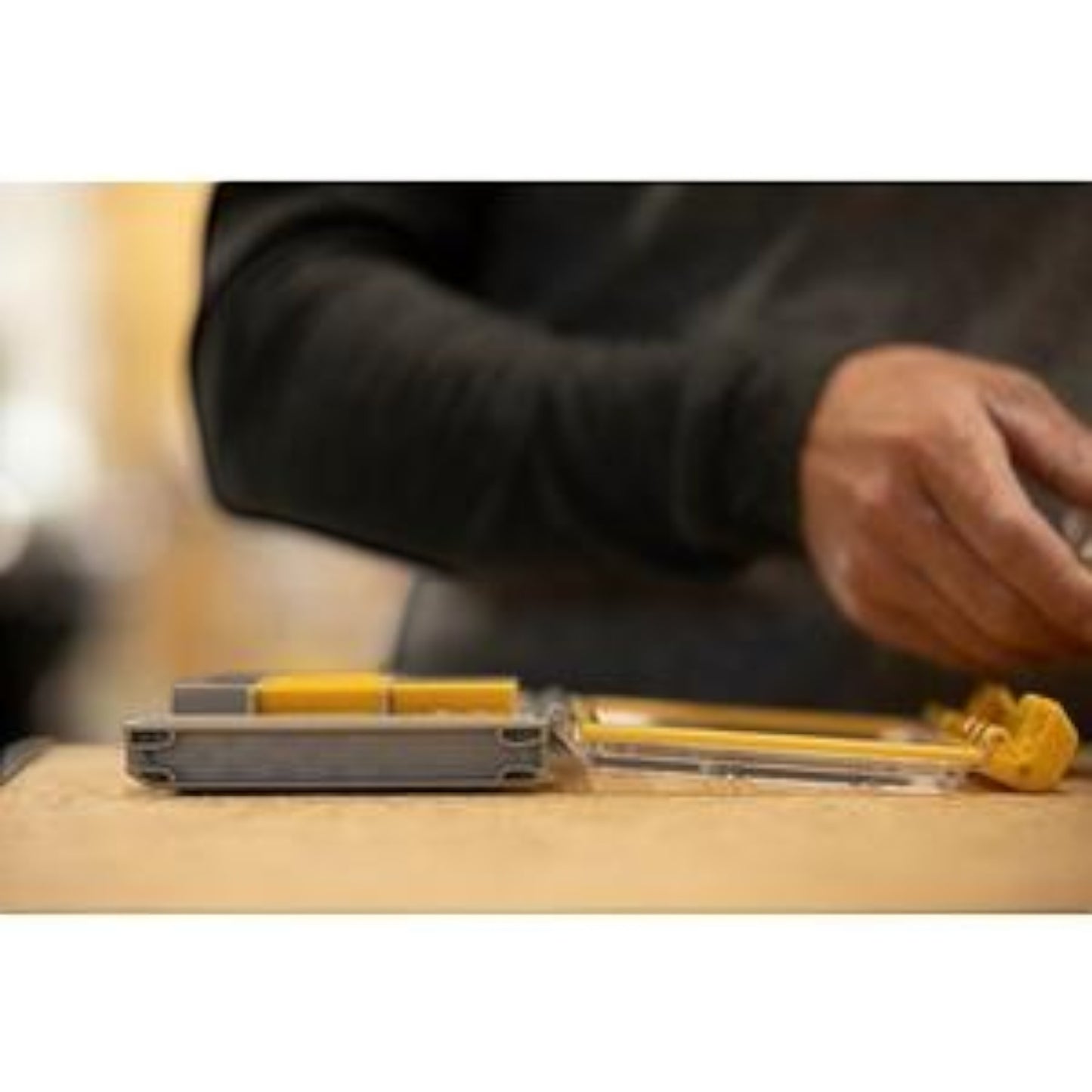 Dogfish Tackle & Marine Plano Edge 3500 utility box with clear lid and yellow latch open on a wooden surface