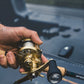 Dogfish Tackle & Marine Shimano Calcutta Conquest MD casting reel, gold finish, with cork handle and black grip.