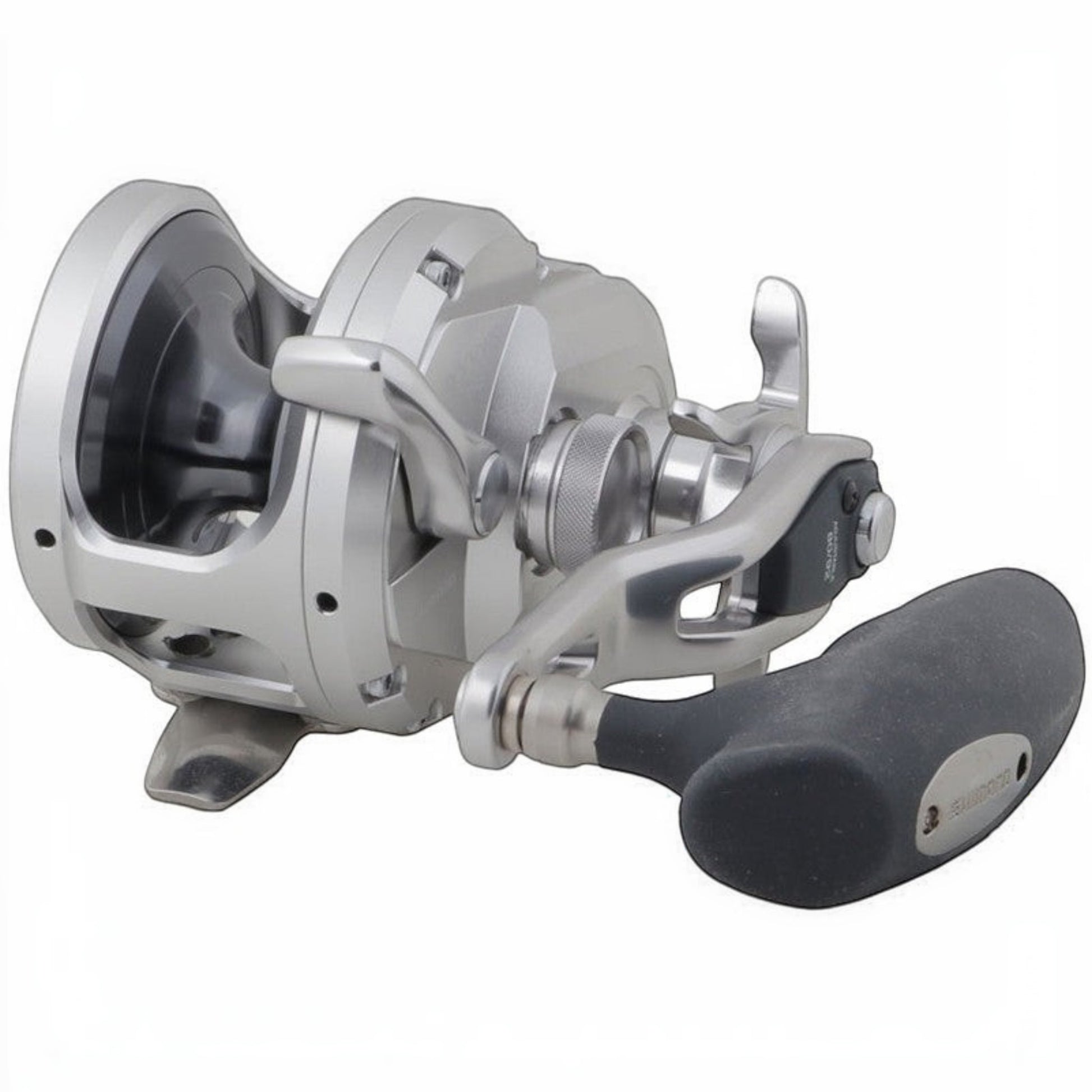 Dogfish Tackle & Marine Shimano Ocea Jigger conventional fishing reel, silver aluminum body, black handle grip, star drag.