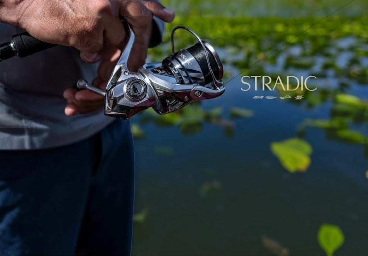 Dogfish Tackle & Marine Shimano Stradic FM spinning reel, silver and black with a machined aluminum handle and cold-forged spool.