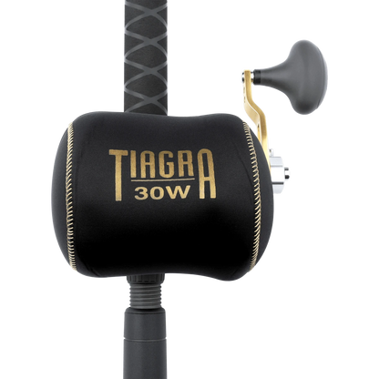 Dogfish Tackle & Marine Shimano Tiagra 30W reel cover, black neoprene with gold logo and stitching.