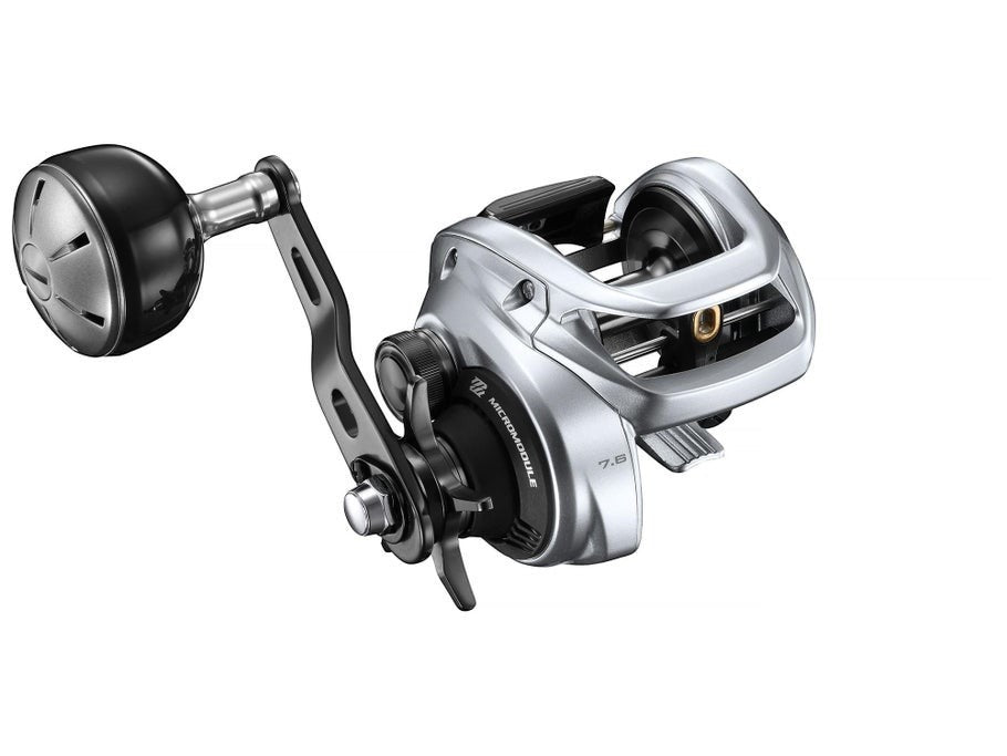 Dogfish Tackle & Marine Shimano Tranx 400 B baitcasting reel, silver aluminum body with black handle and spool. Features MicroModule gears and 7.6 gear ratio.