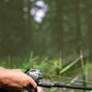 Dogfish Tackle & Marine Shimano Tranx B baitcasting reel, silver and black, with fishing line.
