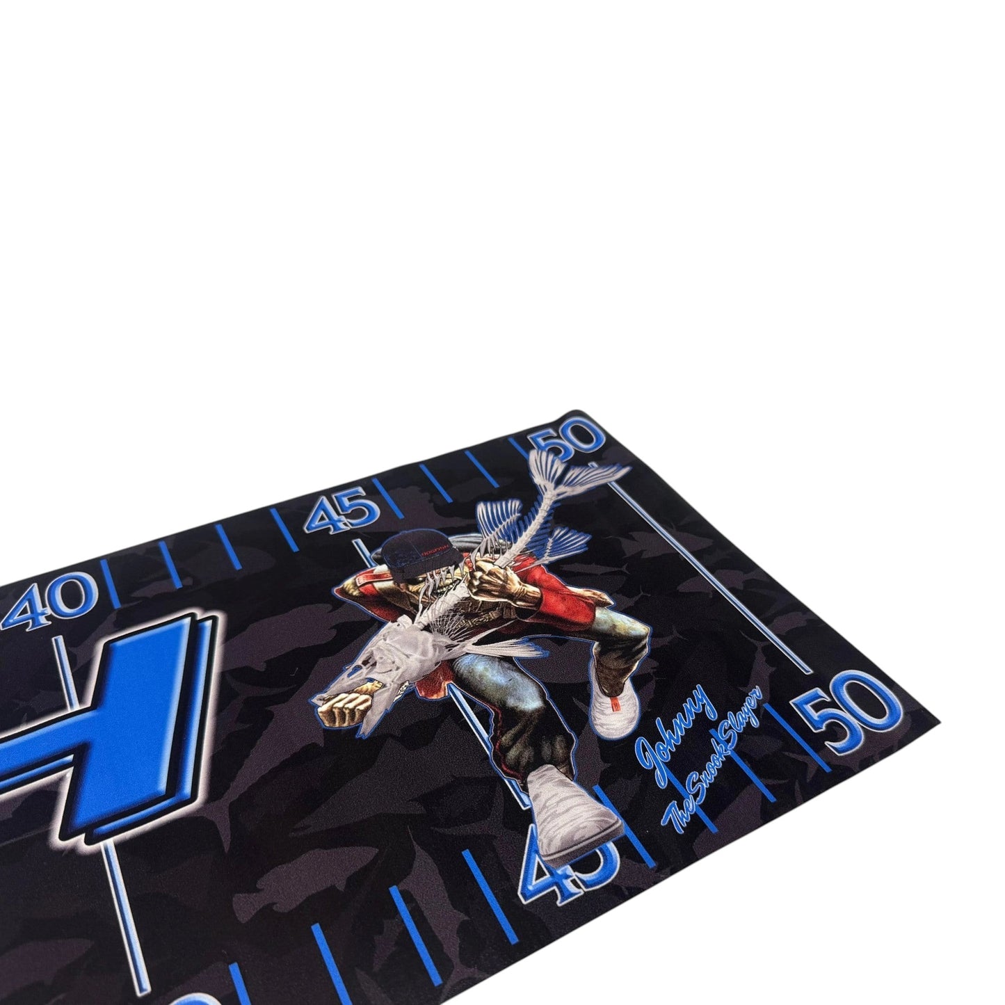 Dogfish Tackle & Marine Snook Slayer vinyl fish measuring ruler with graphic design against a sunset ocean background