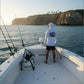 Dogfish Tackle & Marine white long sleeve hooded microfiber shirt with Florida flag graphic on back.