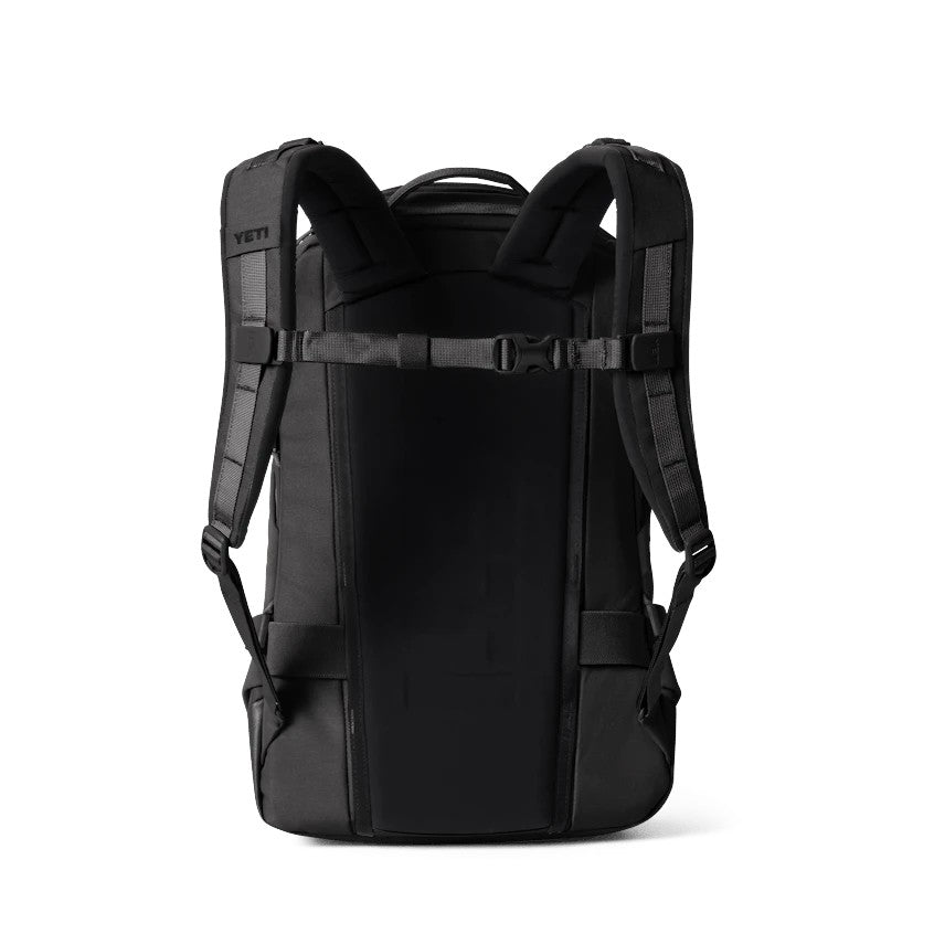 Dogfish Tackle & Marine Yeti Ranchero 22L black backpack showing padded shoulder straps and back panel design