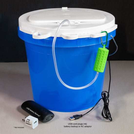 Blue bucket with a pump on a white background
